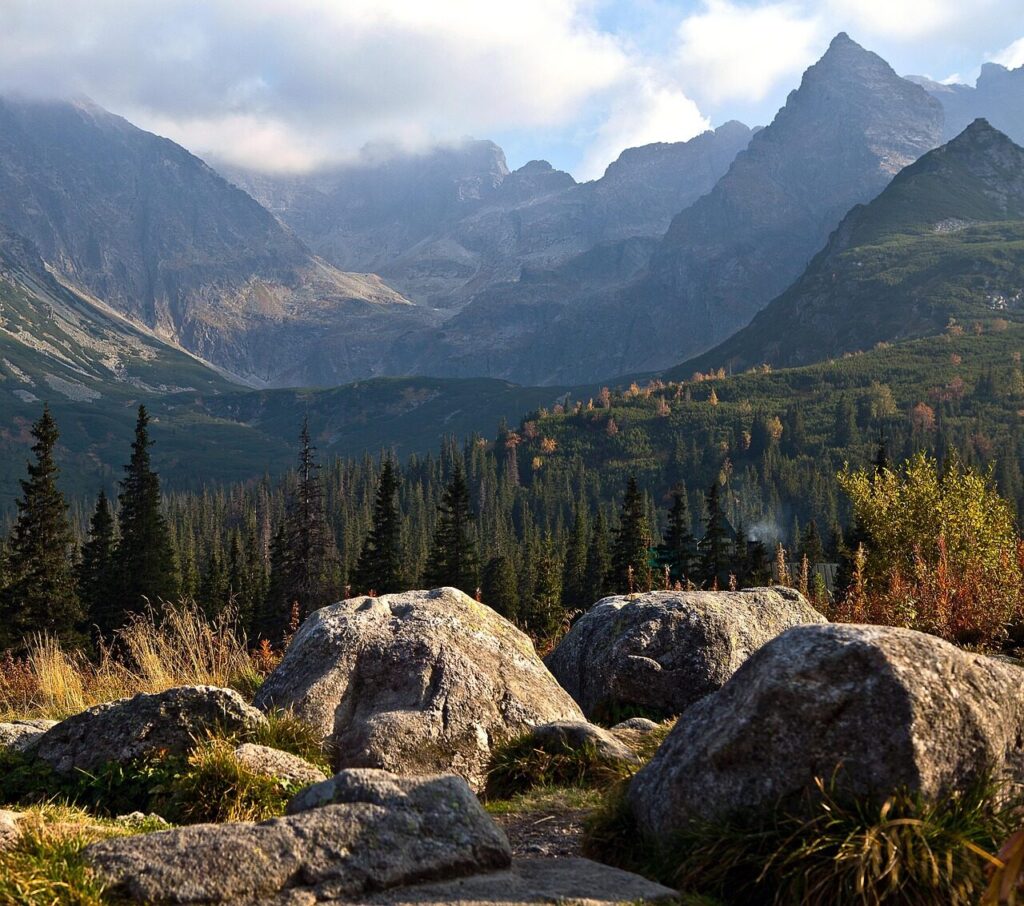 polish tatra mountains, tatry, poland, the high tatras, track hall, the valley of the, caterpillars, mountain, mountains, top, koscielec peak, the power of the mountains, the majesty of nature, the beauty of the mountains, rocks, stones, trees, spruce, mountain pine, mountain view, landscape, rock, blue, nature, the background, gave, size, vastness, power, sky, grass, dark, autumn, aura, sunset, tourism, hiking, mountain trails, forest, slope, hall, meadow, shelter, rest, holiday, panorama, murowaniec shelter, shadows, dream, distance, space, freedom, sharpness, perspective, before sunset, clouds